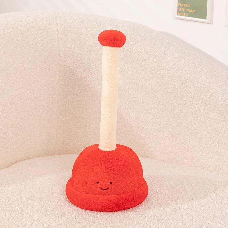 Cute red plunger plushie, part of toilet plushie collection.