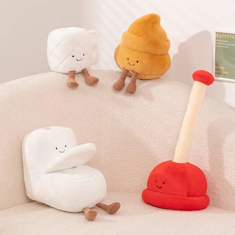 Toilet plushie set: white toilet, roll, red plunger, brown poop.