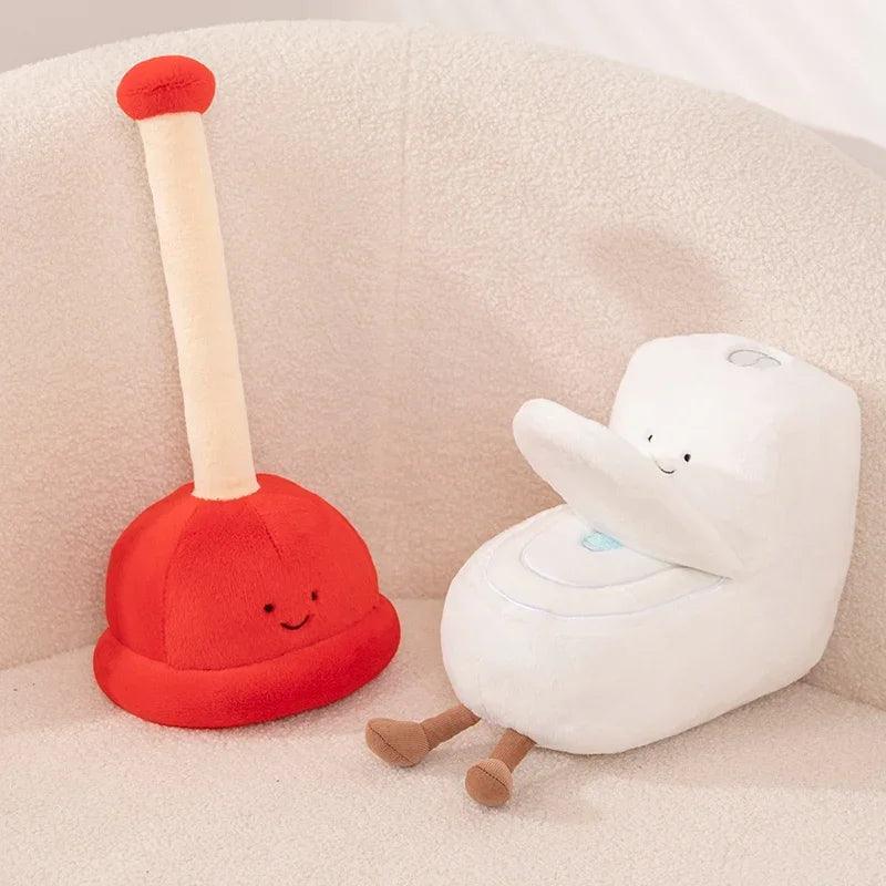 White toilet plushie, 22cm, open lid, next to red plunger plush