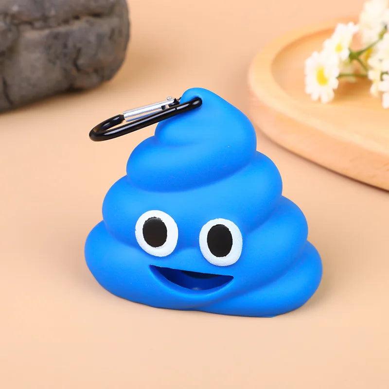Blue poop emoji poop bag dispenser with a carabiner clip, smiling with big eyes on a beige background.