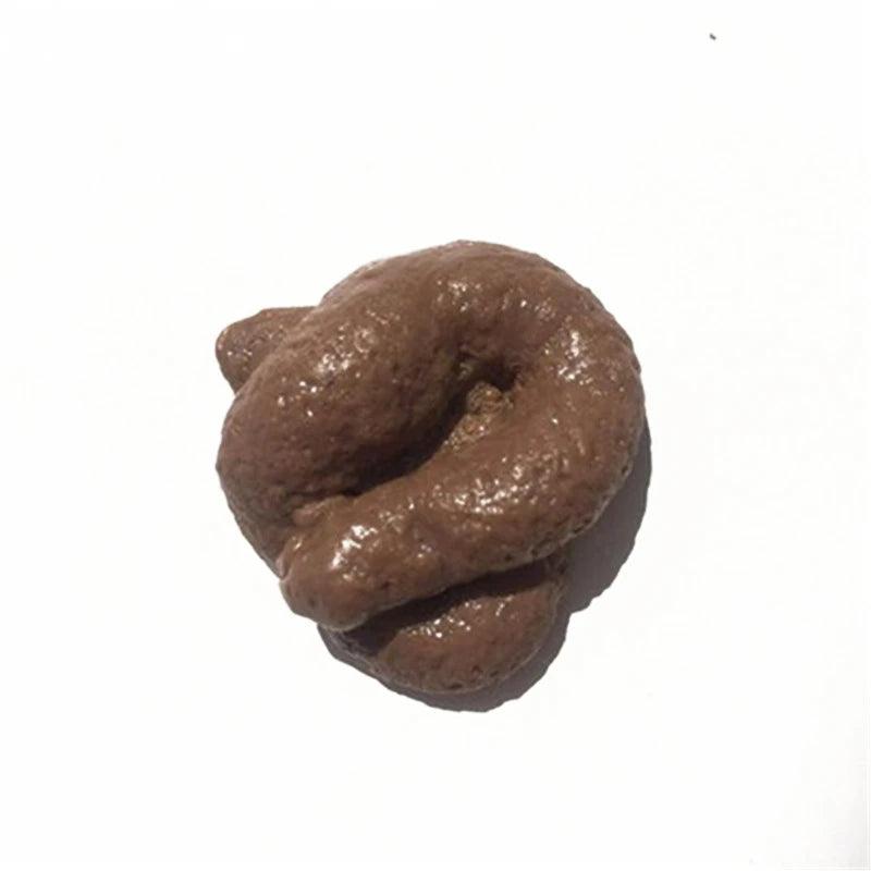 Realistic fake poop shaped like a coil, displayed on a white background with detailed texture.