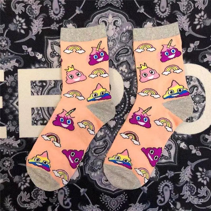 Orange poop socks emoji with unicorn, rainbow and pink poop design